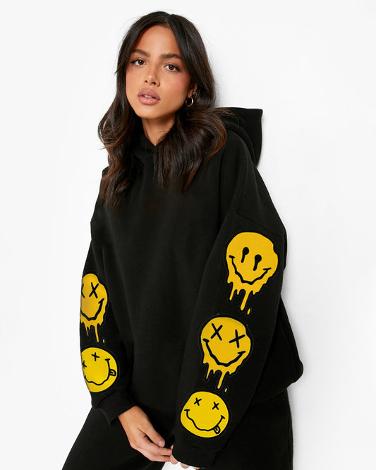 Bold Women's Oversized Smiley Hoodie: Fashionable Flair