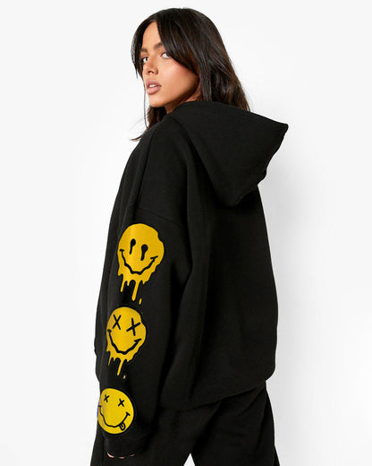 Bold Women's Oversized Smiley Hoodie: Fashionable Flair